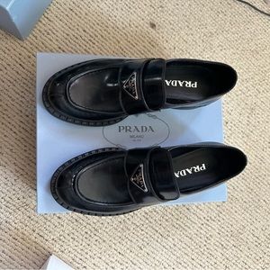 SOLD elsewhere. Prada NWOT Leather Triangle Logo Loafers size 40.5